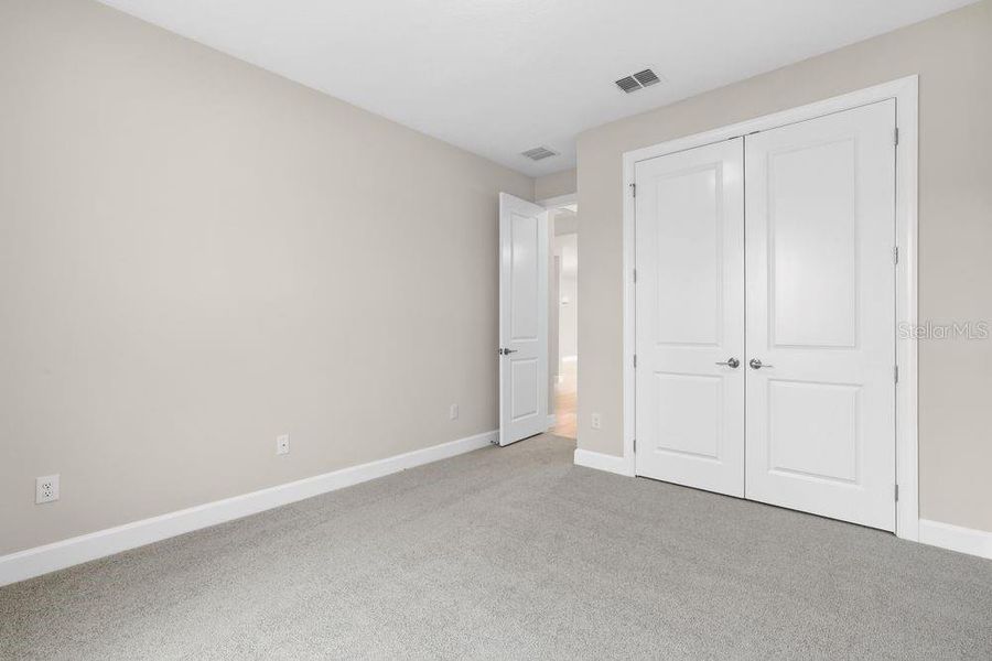 Spacious, unfurnished interior of a new home in Esplanade at Wiregrass Ranch, Wesley Chapel (Image 24).