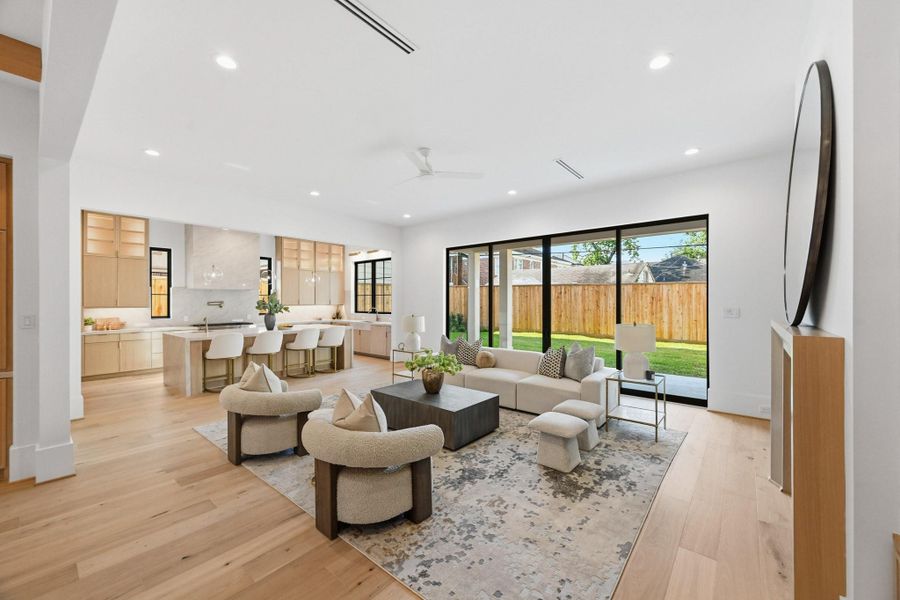 Natural light flows in across the back of the home!