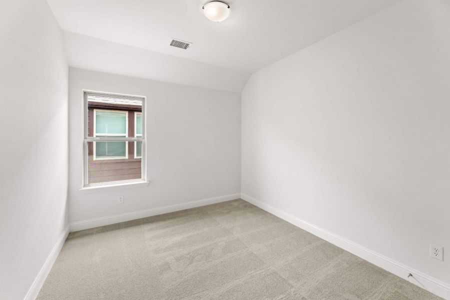 Representative unfurnished interior of a home built from the Willow by UnionMain Homes in Edgewater, Fate (Image 24).
