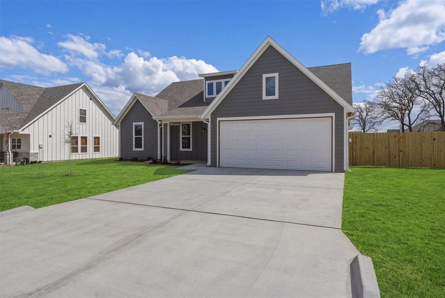 Front exterior of a new home in , Tolar, TX, highlighting curb appeal (Image 2). Front exterior of a new home in , Tolar, TX, highlighting curb appeal (Image 2).