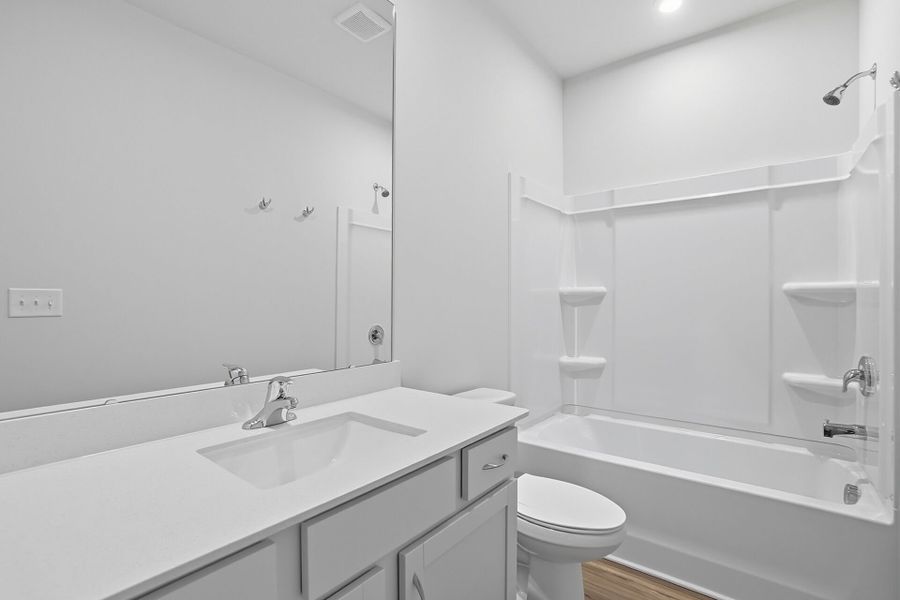 Furnished interior view inside a new home in Waxhaw Landing, Monroe (Image 6).