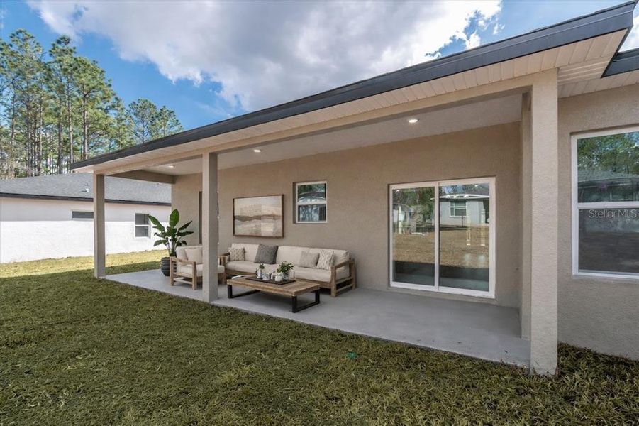Exterior details and patio area of a home in , Citrus Springs (Image 36).