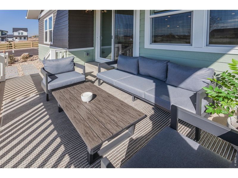 Exterior details and patio area of a home in Trailside Story Collection - Single Family Homes, Timnath (Image 22).
