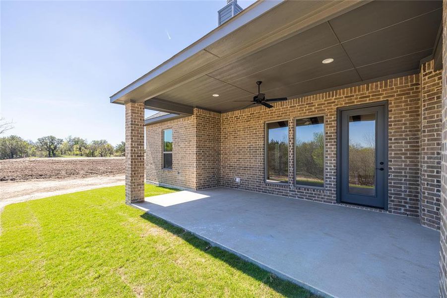 View of patio with ceiling fan