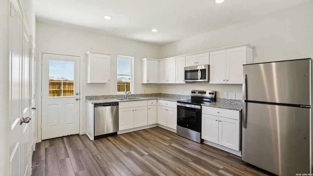 Furnished interior view inside a new home in Roosevelt Heights, San Antonio (Image 4).