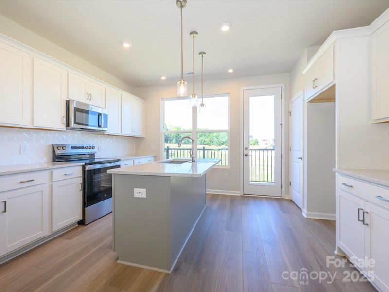 Bright and modern kitchen with sleek finishes.