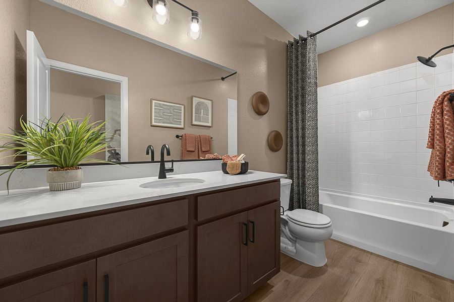 Representative furnished interior of a home built from the 1543 Modeled by KB Home in Legato, Commerce City (Image 13).