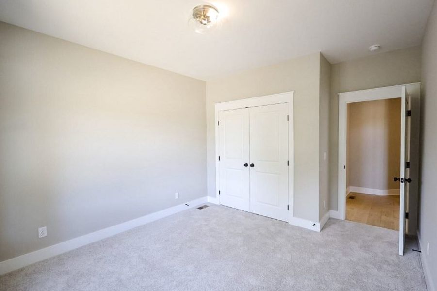 Spacious, unfurnished interior of a new home in Baker Road, Birchwood (Image 72).