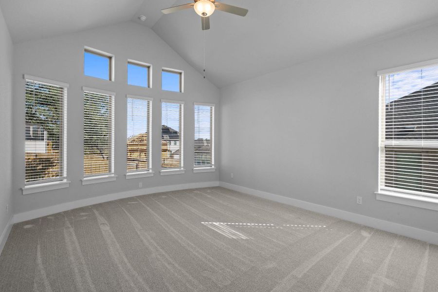 Primary Bedroom with elevated ceiling