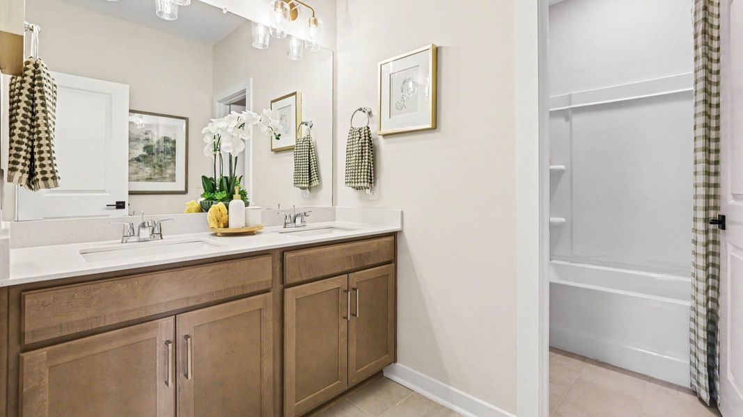 Secondary Bathroom with dual vanity