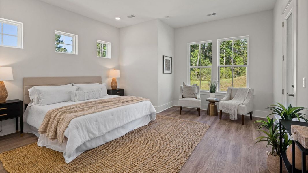 Furnished interior view inside a new home in Summerwind Crossing at Lakes of Cane Bay, Summerville (Image 15).