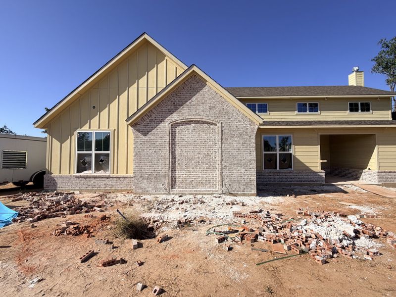 Front exterior of a new home in Monarch Manor, Poolville, TX, highlighting curb appeal (Image 5).