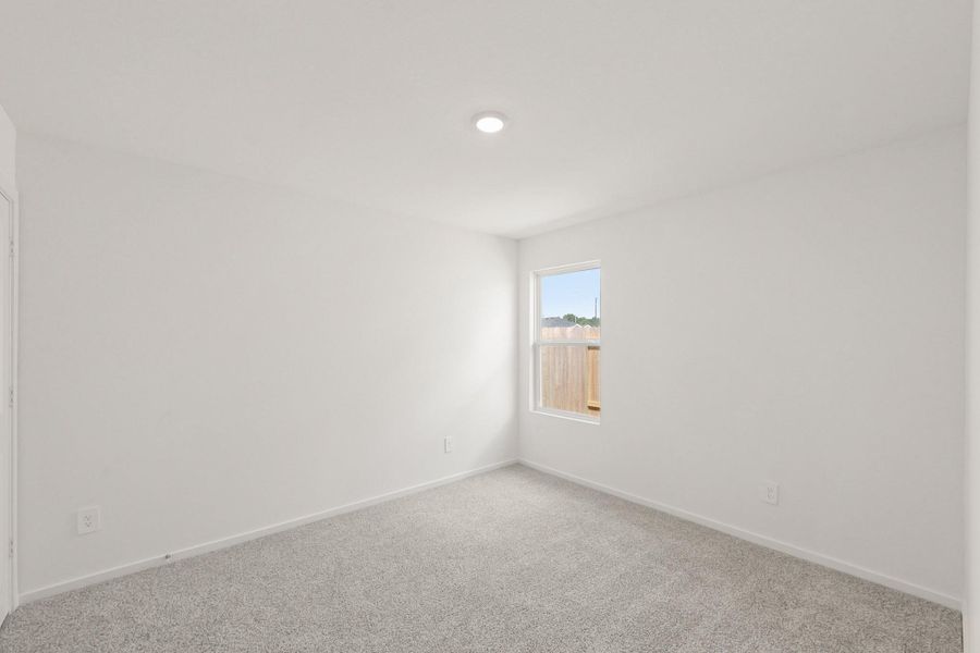 Spacious, unfurnished interior of a new home in New Waverly Station, New Waverly (Image 12).