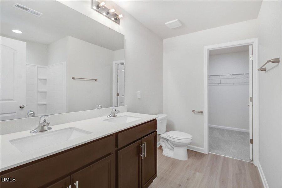 11-Owner_s bathroom with double vanity a