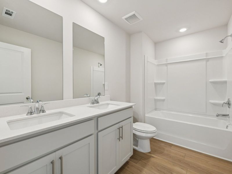 Furnished interior view inside a new home in Harmony Manor, Fairburn (Image 11).