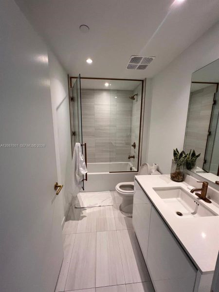 Furnished interior view inside a new home in Mr. C Residences, Miami (Image 10).