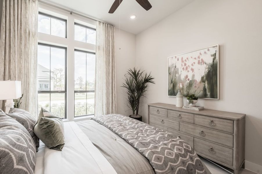 Representative furnished interior of a home built from the Carignan by Tri Pointe Homes in Woodson’s Reserve, Spring (Image 7).