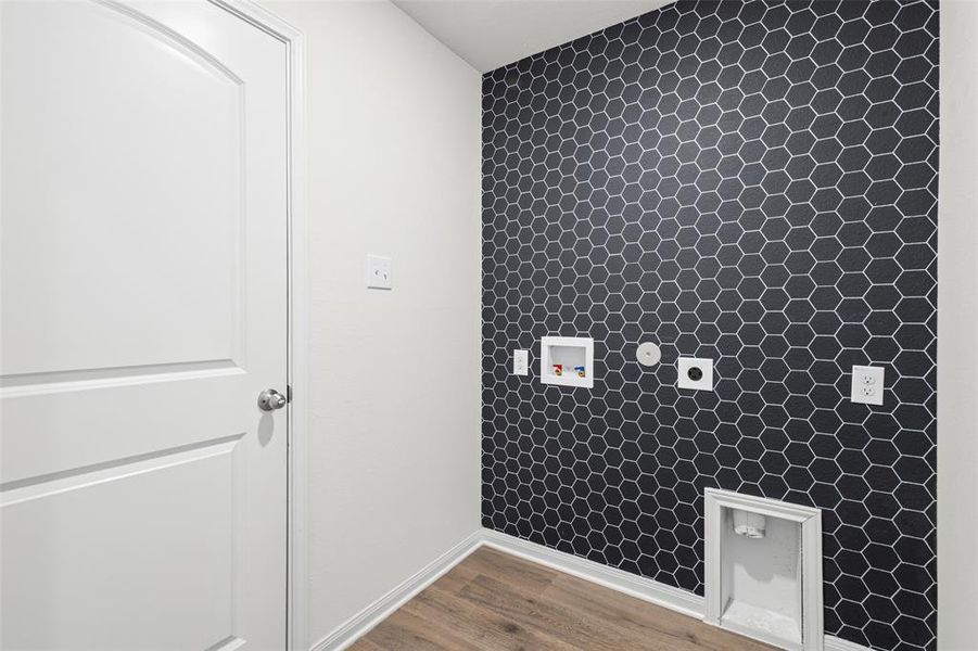 Large utility room with door to the garage Large utility room with door to the garage