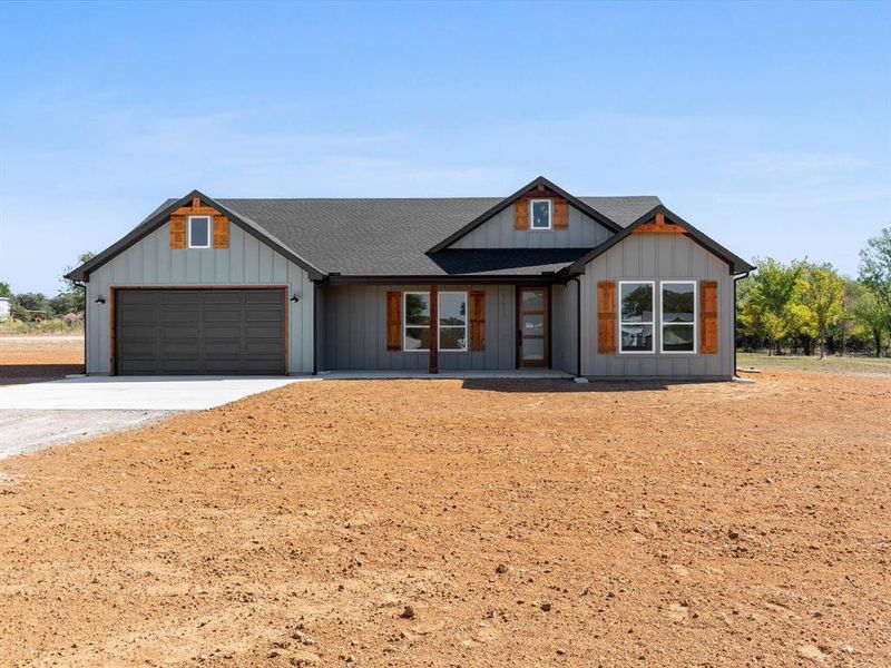 Front exterior of a new home in , Boyd, TX, highlighting curb appeal (Image 25). Front exterior of a new home in , Boyd, TX, highlighting curb appeal (Image 25).