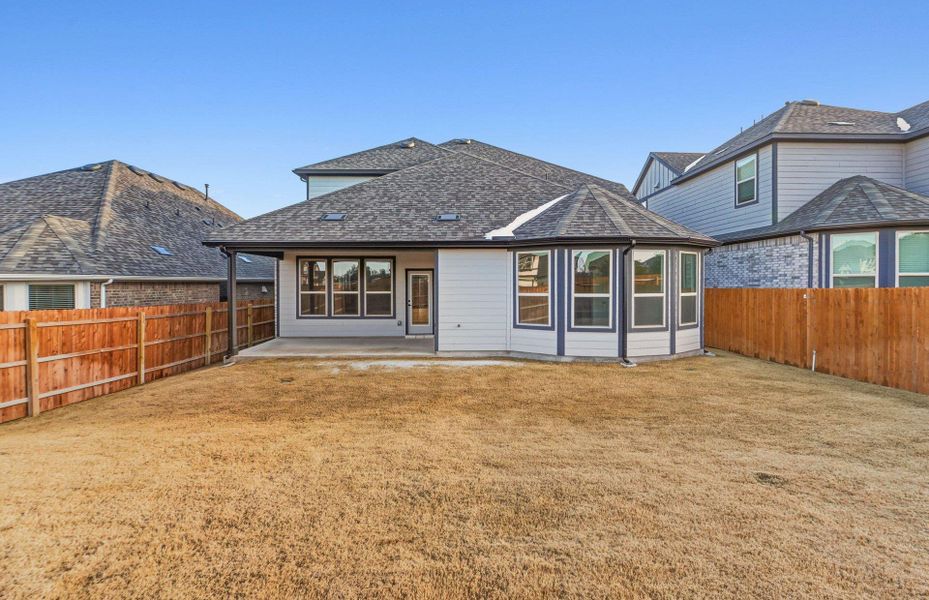 Exterior details and patio area of a home in Saddleback at Santa Rita Ranch, Liberty Hill (Image 3).