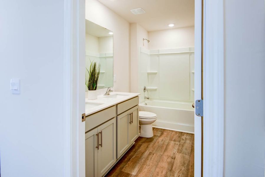 Representative furnished interior of a home built from the Penwell by D.R. Horton in Carter Ridge, Greenville (Image 35).