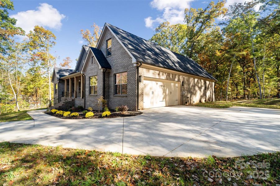 Front exterior of a new home in , Gastonia, NC, highlighting curb appeal (Image 1). Front exterior of a new home in , Gastonia, NC, highlighting curb appeal (Image 1).
