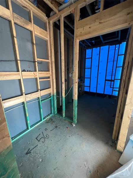 Unique built-in mudroom area off the utility room will have cabinets and hooks for storing shoes, jackets, backpacks, etc. Swipe over to see a representation of this space once completed.