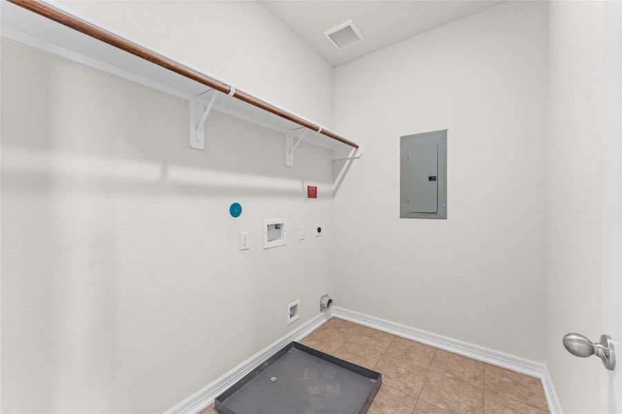 Breaker box located in the utility room for easy access. Breaker box located in the utility room for easy access.
