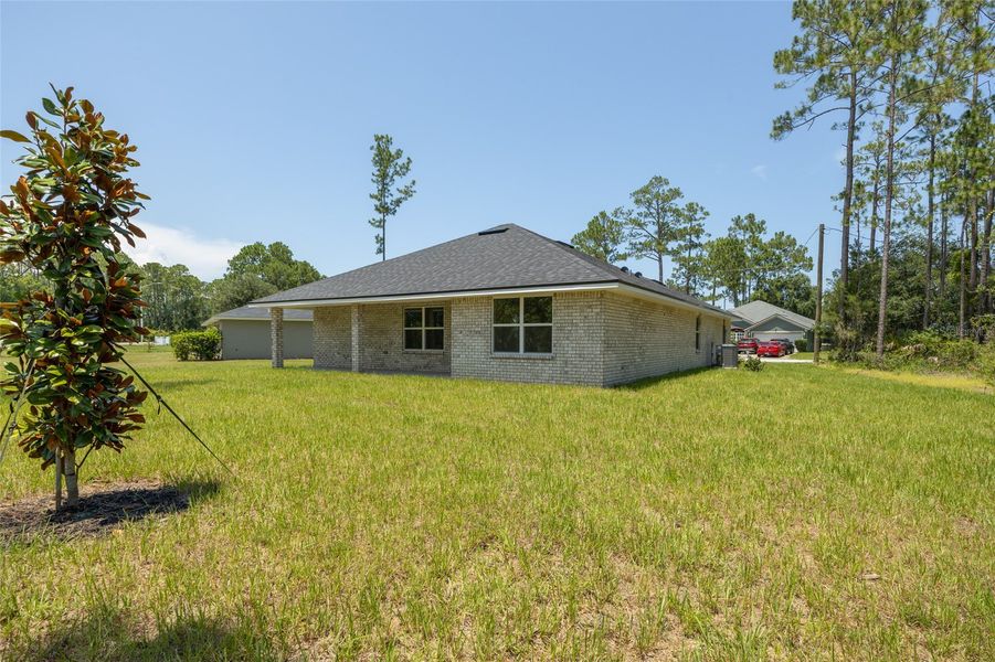 Exterior details and patio area of a home in Palm Coast, Palm Coast (Image 20).