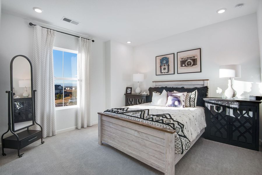Furnished interior view inside a new home in Reunion, Commerce City (Image 10).