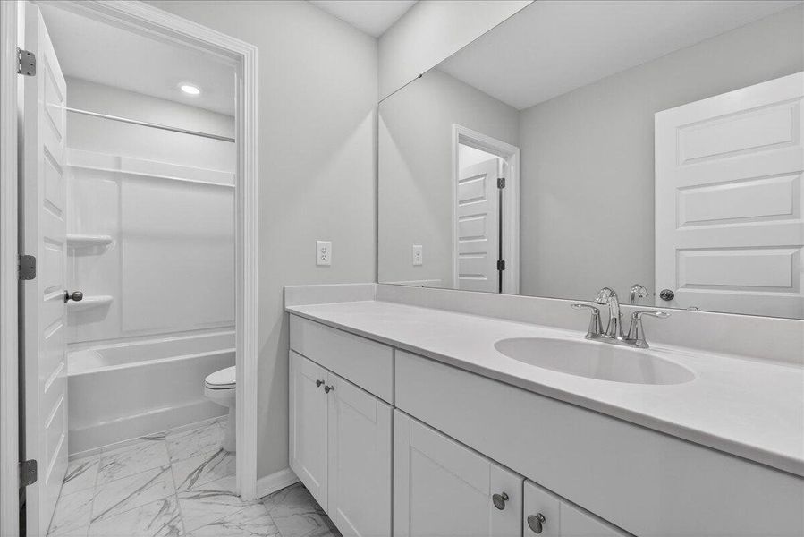 Furnished interior view inside a new home in Sweetgrass at Summers Corner, Summerville (Image 8).