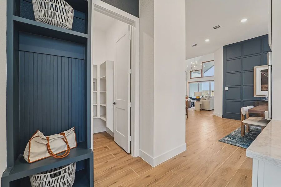 Representative furnished interior of a home built from the Sydney by Chesmar Homes in Meridiana 60's, Manvel (Image 27).