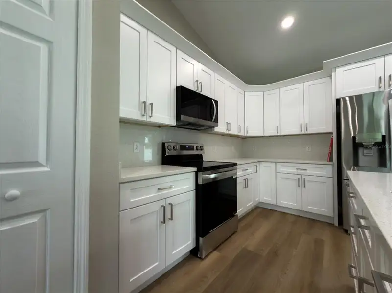 Furnished interior view inside a new home in , Deltona (Image 8).