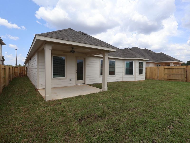 Exterior details and patio area of a home in Lone Star Landing, Montgomery (Image 3).