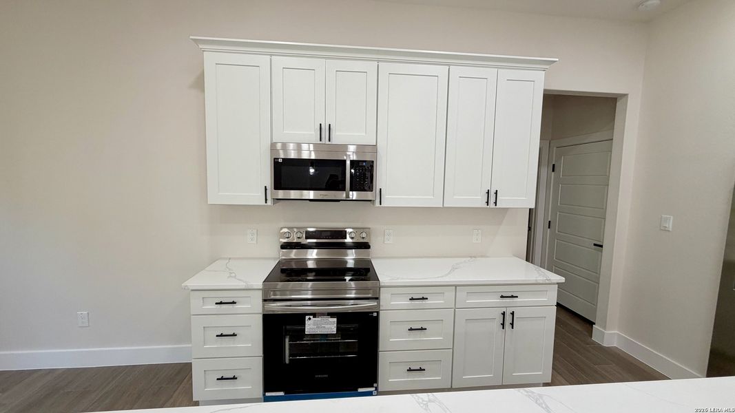 Furnished interior view inside a new home in , Bulverde (Image 32).