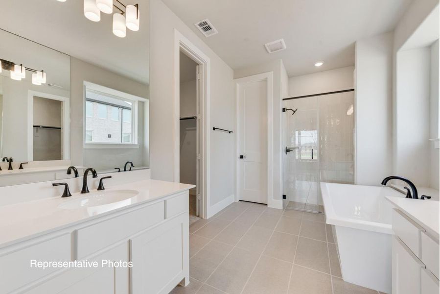 Representative furnished interior of a home built from the Royal Catherine IV by Grand Homes in Edgewater, Fate (Image 9).