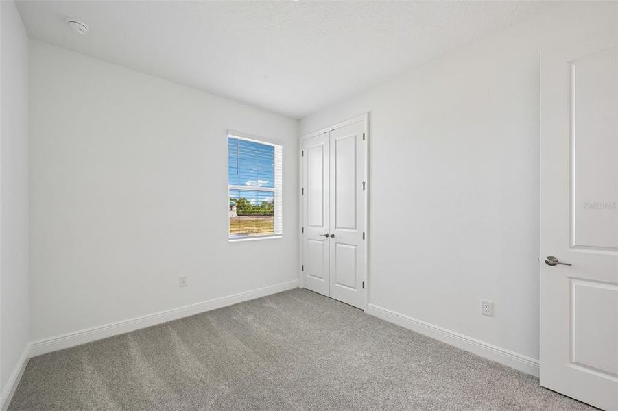 Spacious, unfurnished interior of a new home in Grand Park, Sarasota (Image 27).