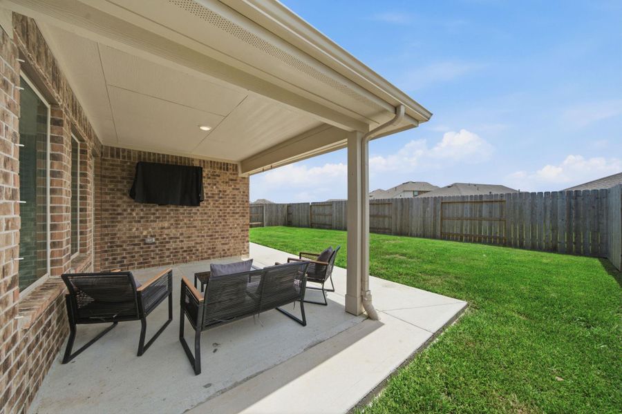 Outdoor space with covered patio.