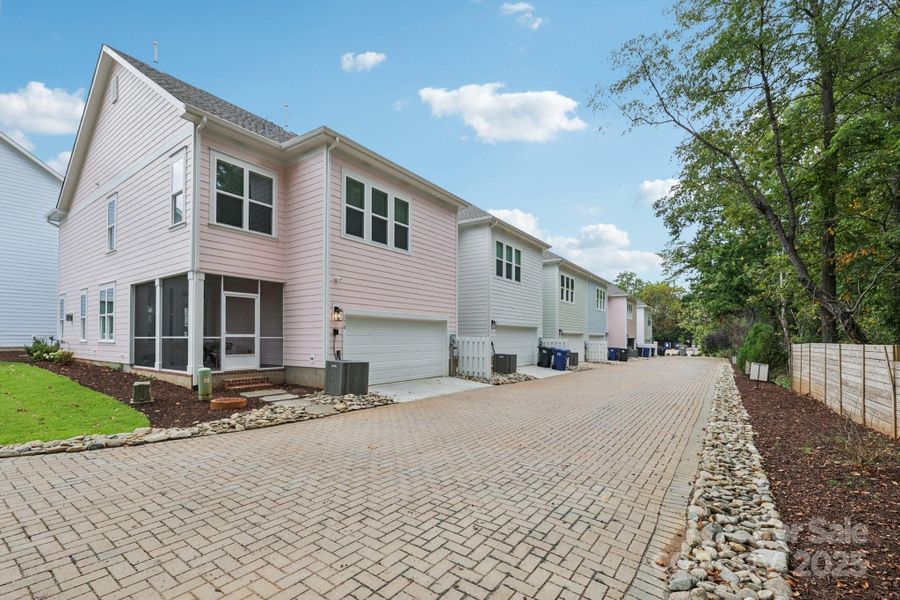 Exterior details and patio area of a home in Walk23, Huntersville (Image 20).