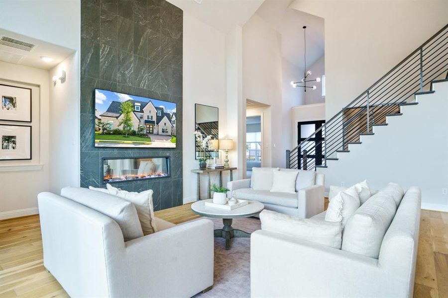 Functional Luxury - The thoughtful design blends form and function—note the open railing staircase, warm wood tones, and seamless transitions that support a lifestyle of ease and elegance. Functional Luxury - The thoughtful design blends form and function—note the open railing staircase, warm wood tones, and seamless transitions that support a lifestyle of ease and elegance.