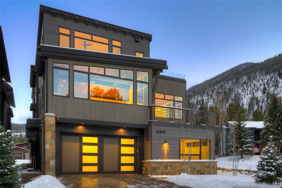 Front exterior of a new home in , Frisco, CO, highlighting curb appeal (Image 21).