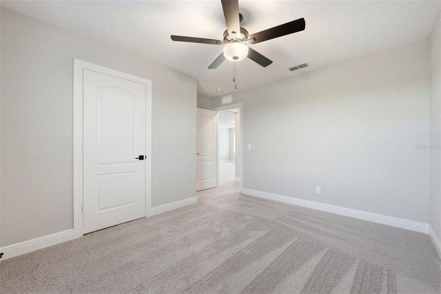Spacious, unfurnished interior of a new home in Gum Lake Preserve, Lake Alfred (Image 50).