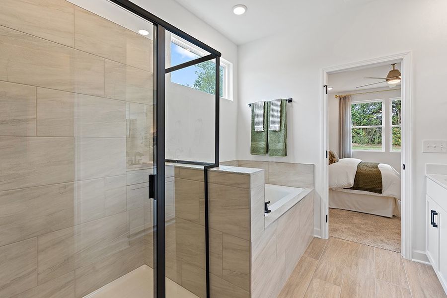A bathroom with a glass shower.