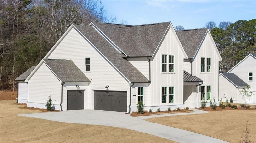 Front exterior of a new home in , Gainesville, GA, highlighting curb appeal (Image 26). Front exterior of a new home in , Gainesville, GA, highlighting curb appeal (Image 26).
