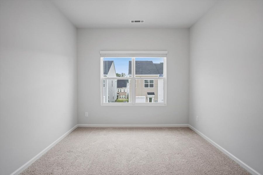 Spacious, unfurnished interior of a new home in Renaissance at White Oak, Garner (Image 27).