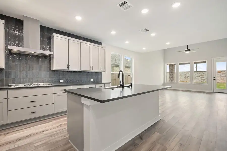 Furnished interior view inside a new home in Flora, Hutto (Image 7).