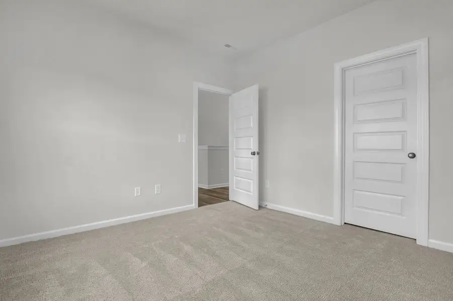 Spacious, unfurnished interior of a new home in Indigo at Abbey Preserve, Wilmington (Image 33).