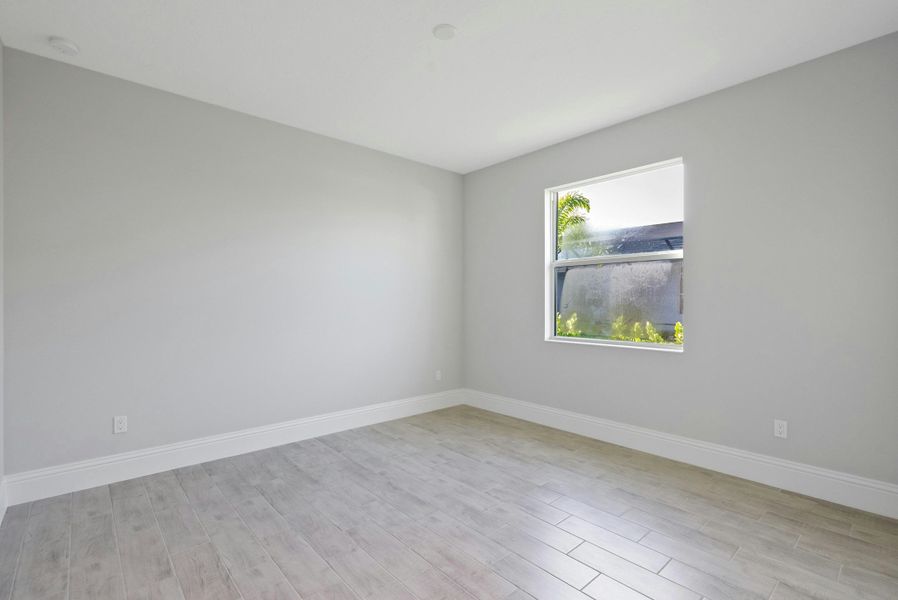 2D floor plan layout for the Monarch Grande by GHO Homes in Belterra, Port St. Lucie, FL (Image 22).