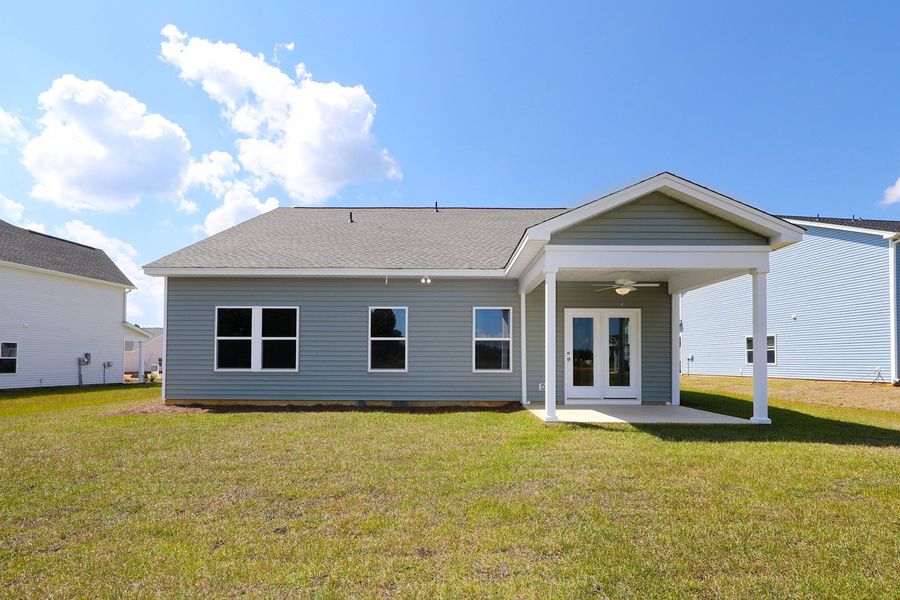 Front exterior of a new home in Garden Grove, Conway, SC, highlighting curb appeal (Image 24). Front exterior of a new home in Garden Grove, Conway, SC, highlighting curb appeal (Image 24).