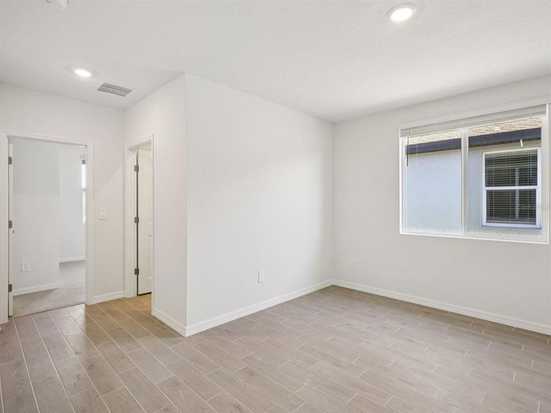 Spacious, unfurnished interior of a new home in Oakfield Trails - Classic Series, Parrish (Image 12).